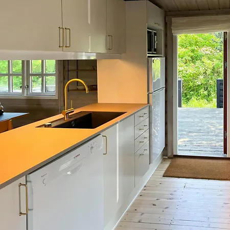 Log With View Of Meadow And Sea Feriehus Tranekær