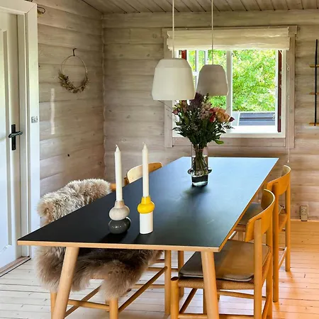 Log With View Of Meadow And Sea Tranekaer