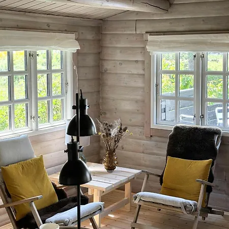 Holiday home Log With View Of Meadow And Sea