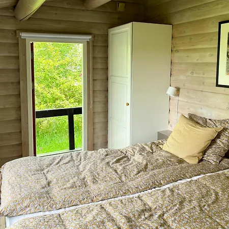 Log With View Of Meadow And Sea * Tranekaer