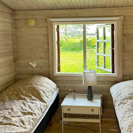 Holiday home Log With View Of Meadow And Sea Tranekaer