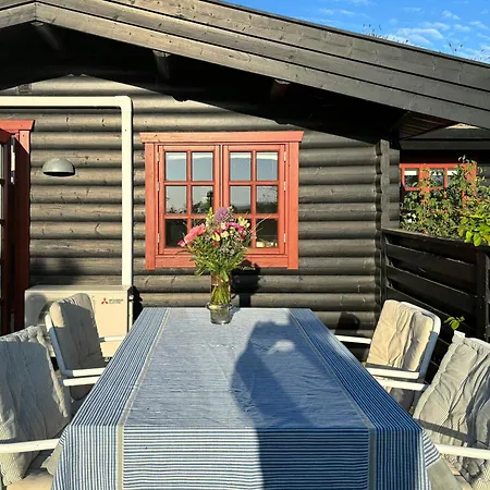 Log With View Of Meadow And Sea Holiday home Tranekaer