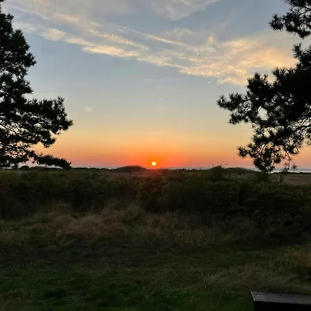 Log With View Of Meadow And Sea * Tranekær