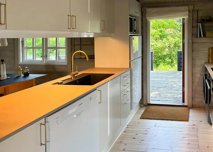 Log With View Of Meadow And Sea Feriehus Tranekær