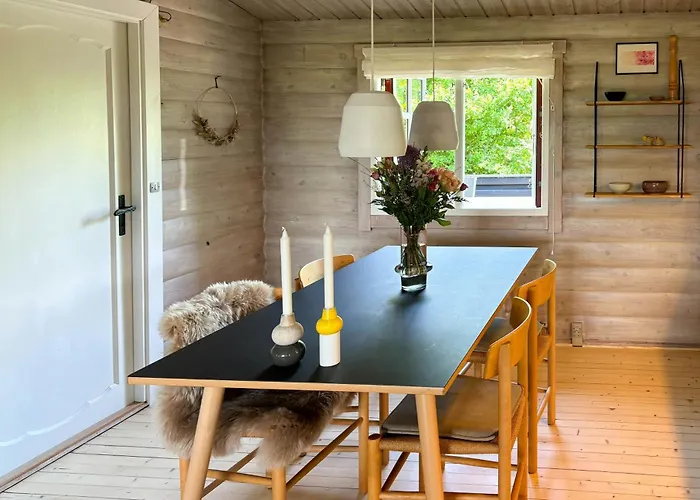 Log With View Of Meadow And Sea Tranekaer