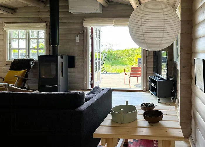 Log With View Of Meadow And Sea * Tranekær