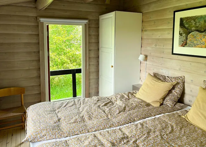 Log With View Of Meadow And Sea * Tranekær