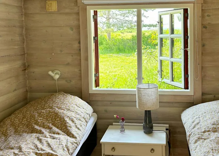 Holiday home Log With View Of Meadow And Sea Tranekaer
