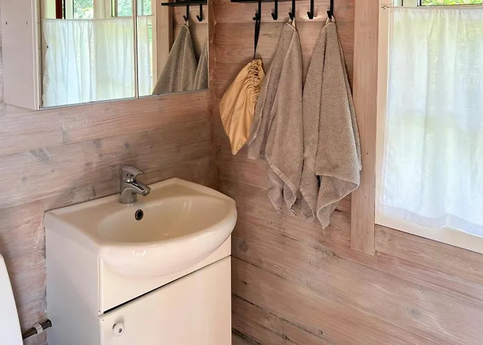 Holiday home Log With View Of Meadow And Sea